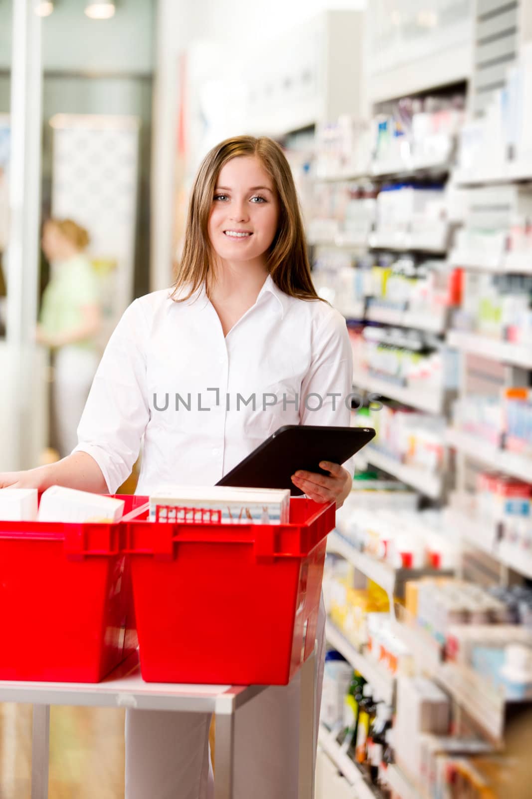 Pharmacist with Digital Tablet Prescription by leaf