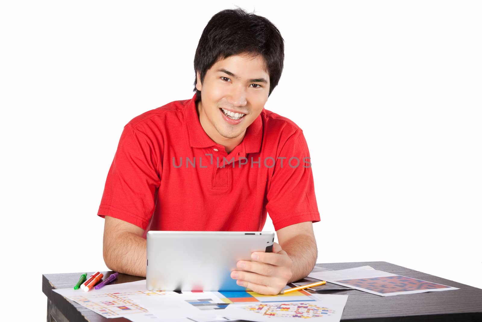 Young architect Asian man at work isolated on white background.