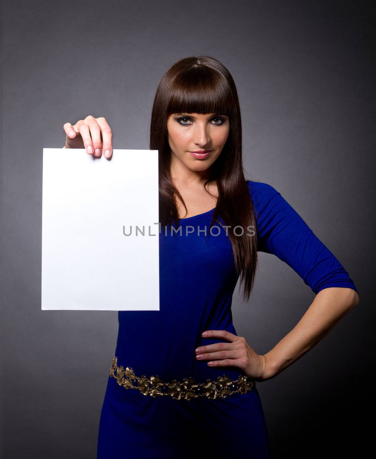 Attractive Woman with Blank Message Sign by leaf