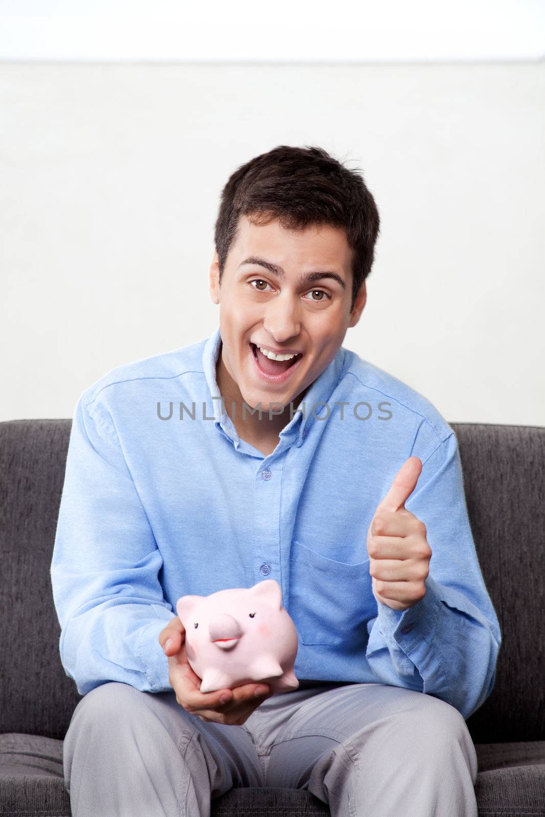 Man with Piggy Bank by leaf