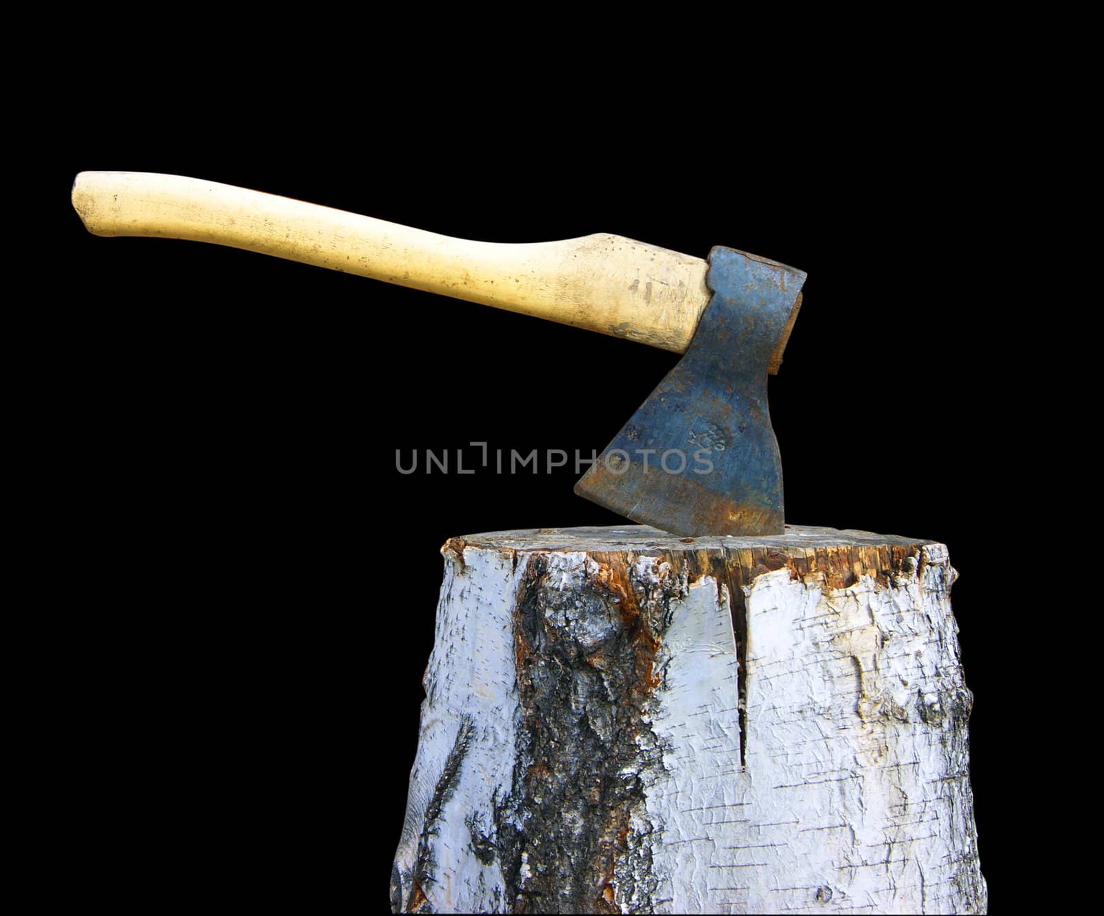 Axe and birch log on black background is insulated