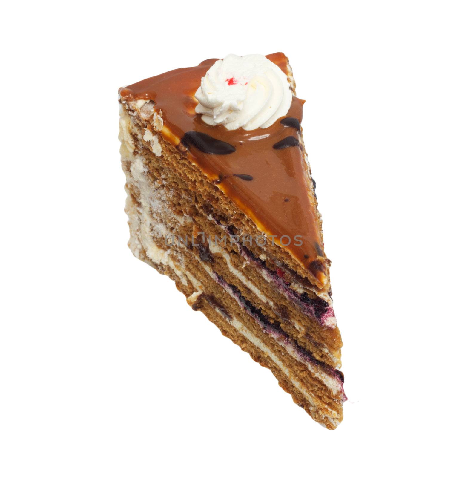 Slice of cream cake with chocolate on the white background 