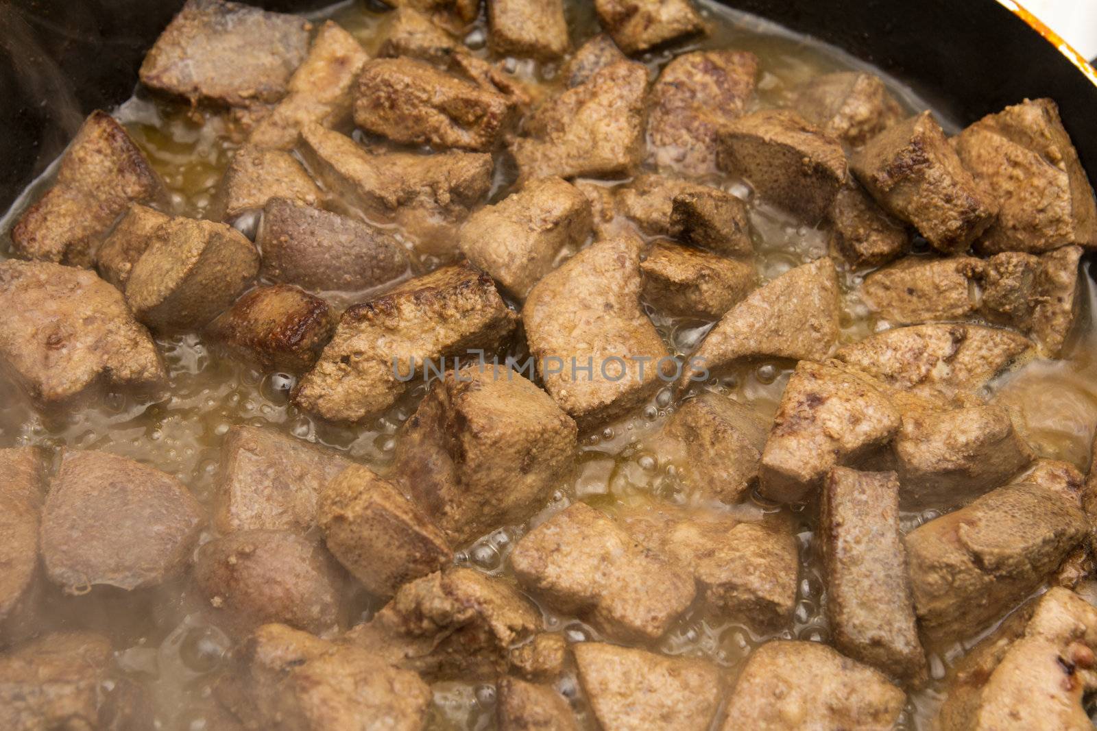 fried liver in a pan