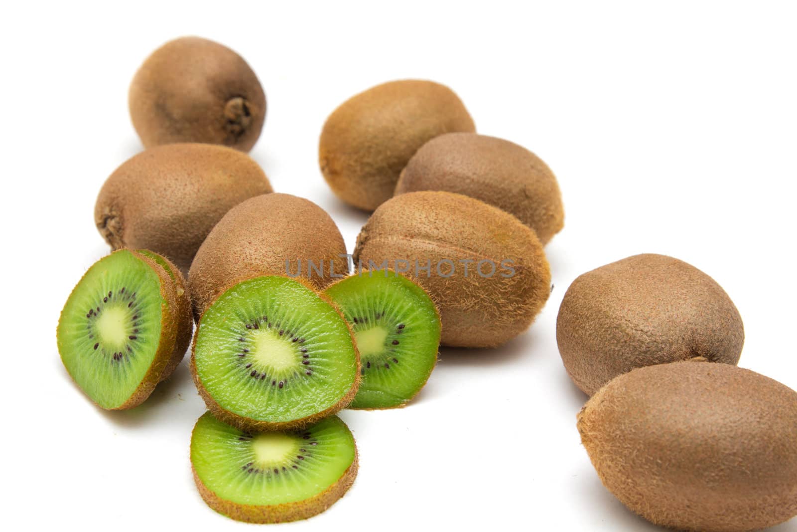 sliced and whole kiwi isolated on white background 