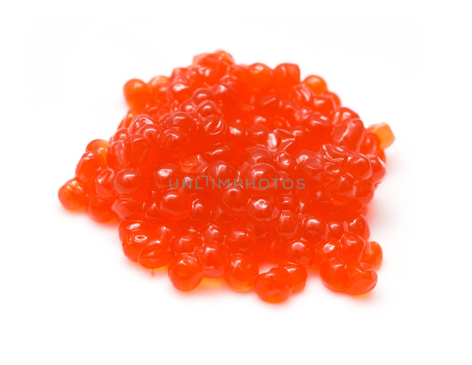 Red salmon caviar heap isolated on white 