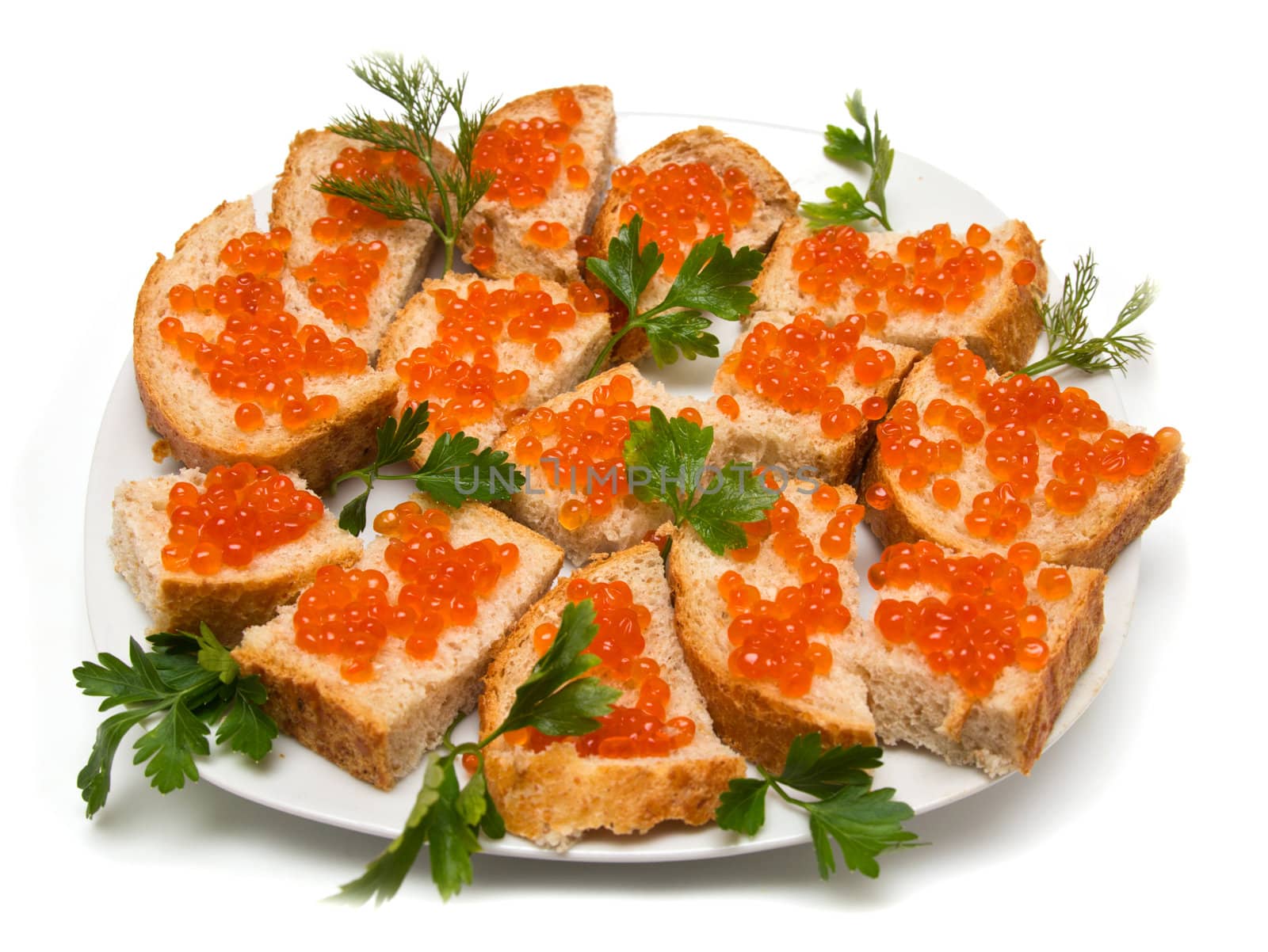 red caviar on bread with parsley