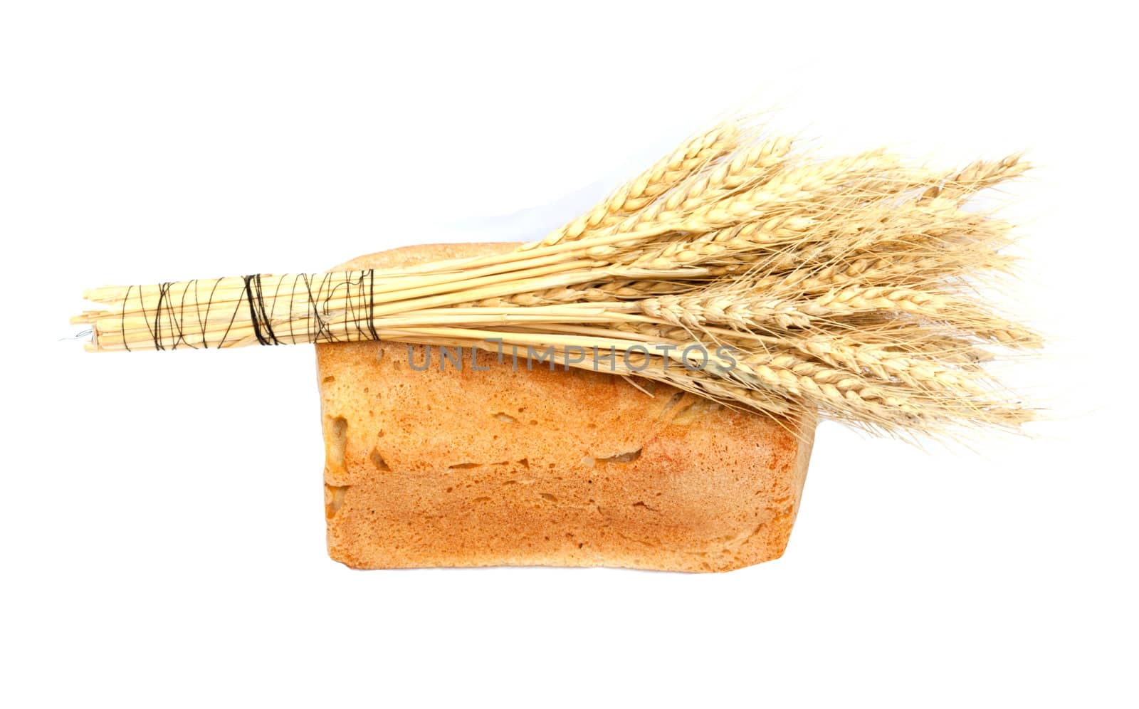 Bread and wheat on a white background 