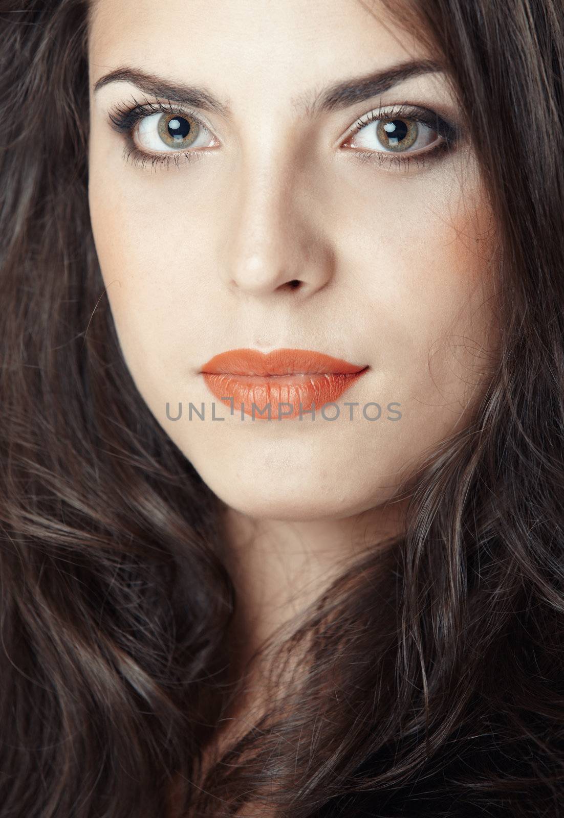 Attractive lady with perfect makeup. Close-up portrait