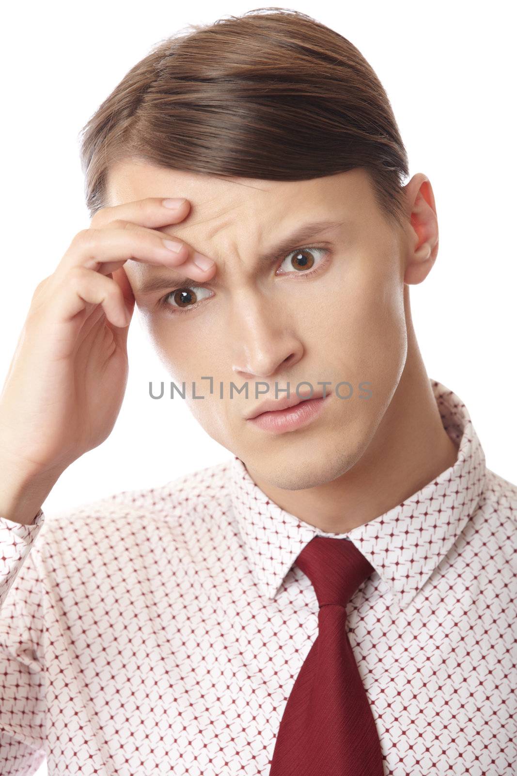 Businessman suffering from the headache and emotional stress