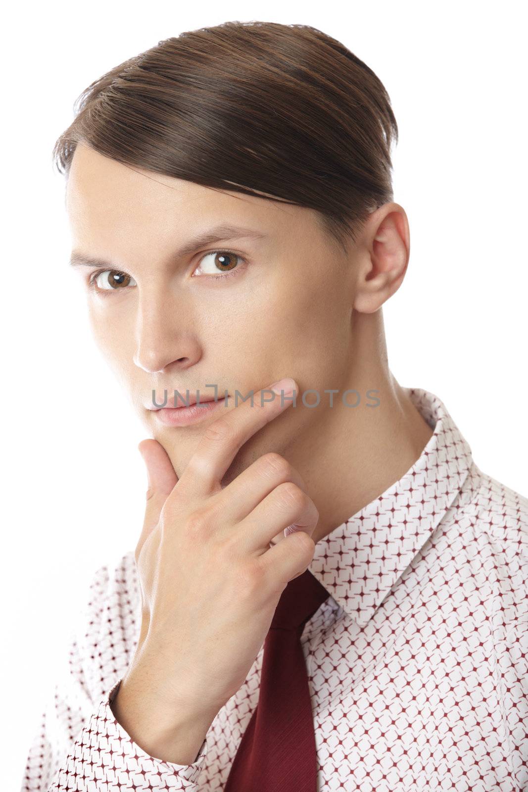 Businessman in formal wear thinking on a white background