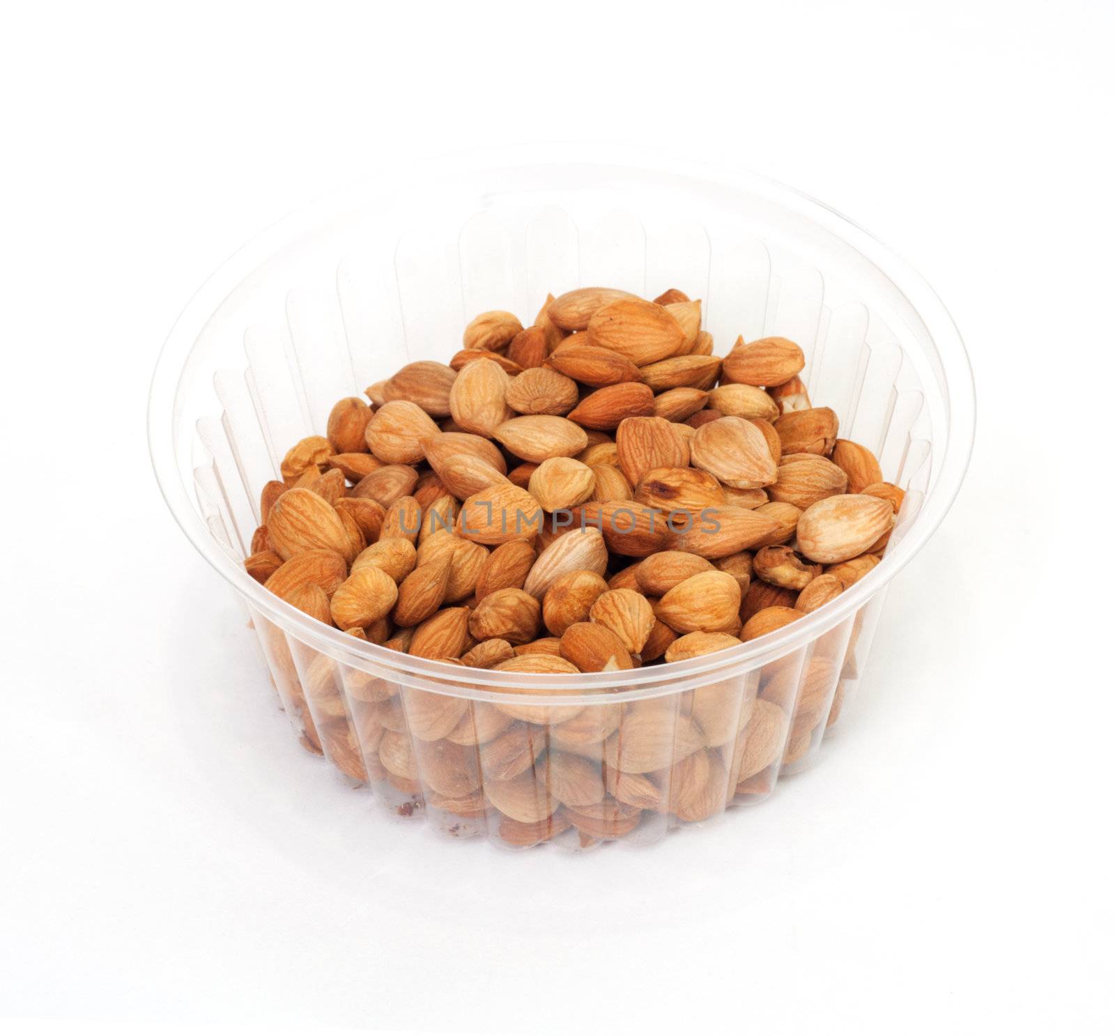 Almonds on white background  by schankz