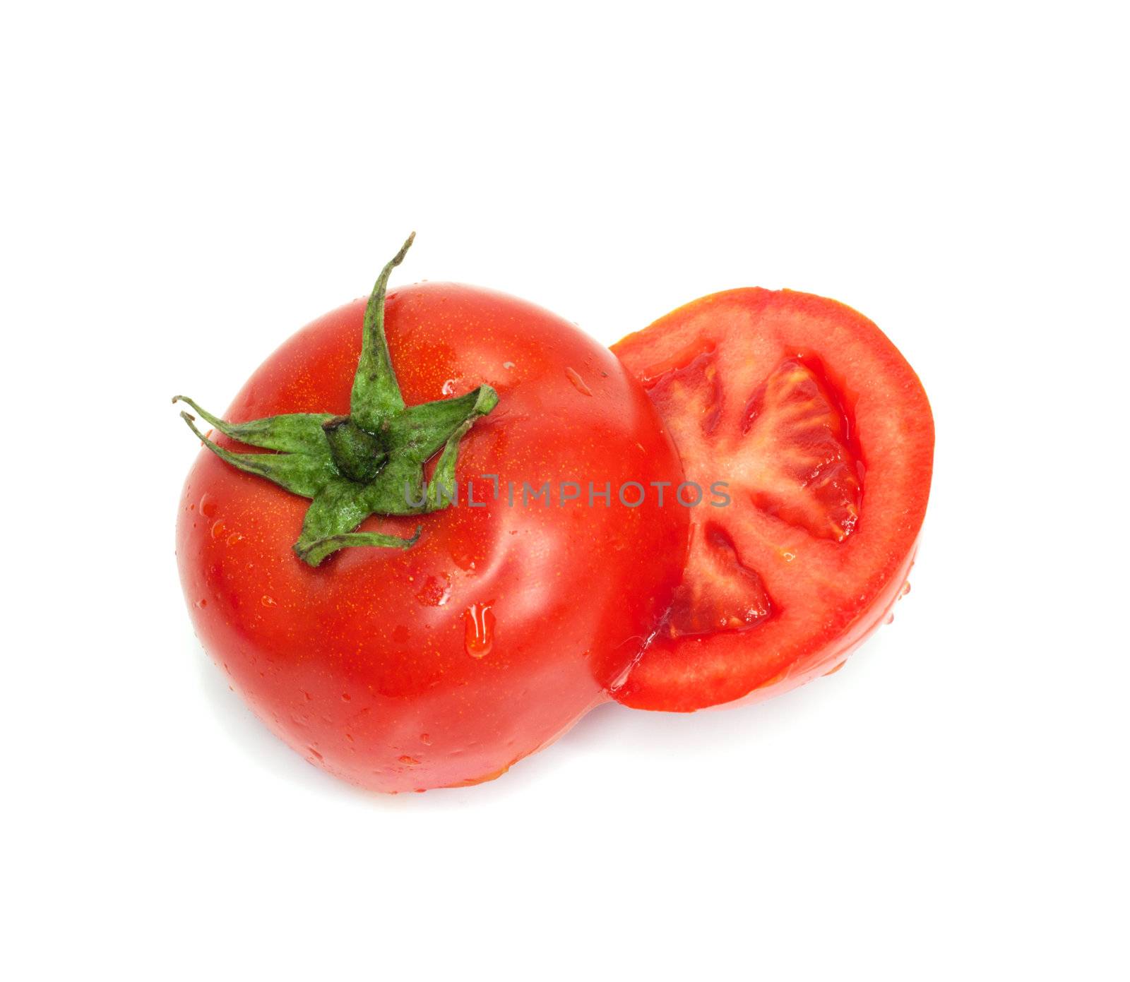 fresh ripe tomato isolated on white background  by schankz