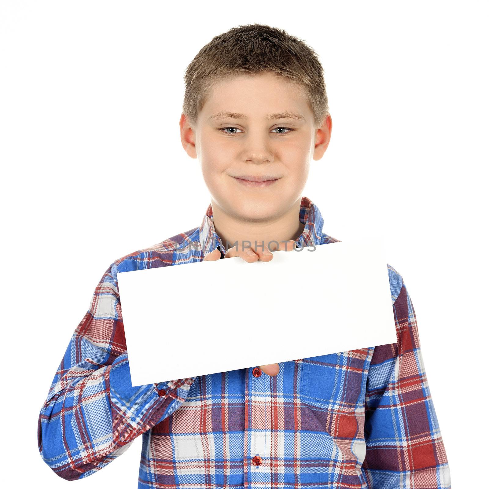 Boy standing with empty horizontal blank in hand