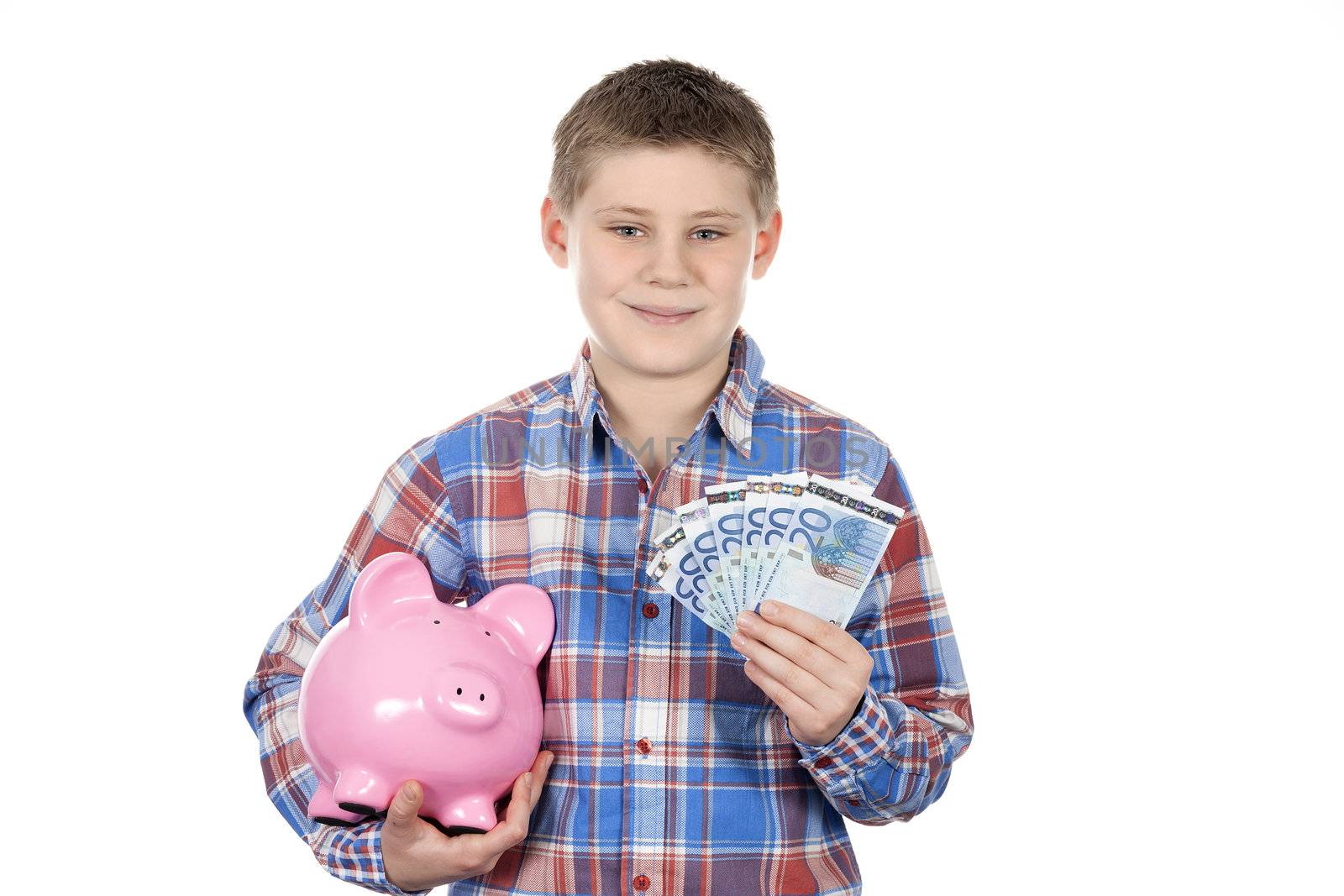Cute boy with piggy bank and banknote on white background