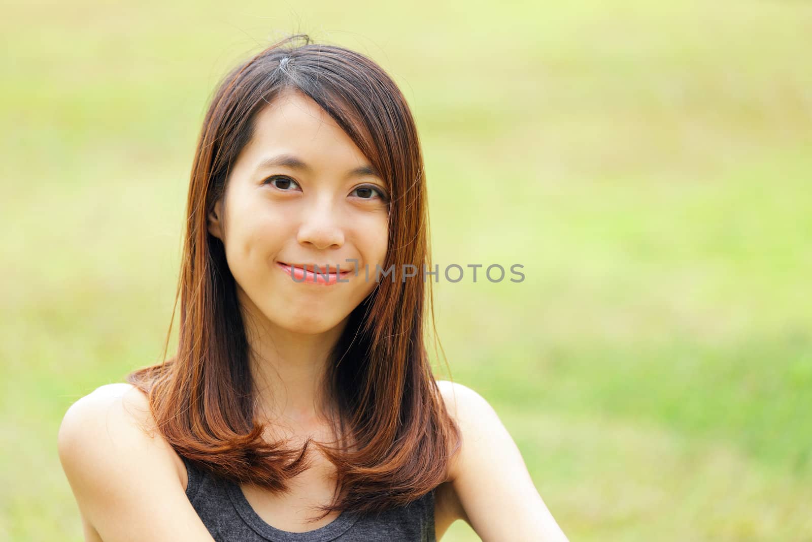 young woman smiling friendly