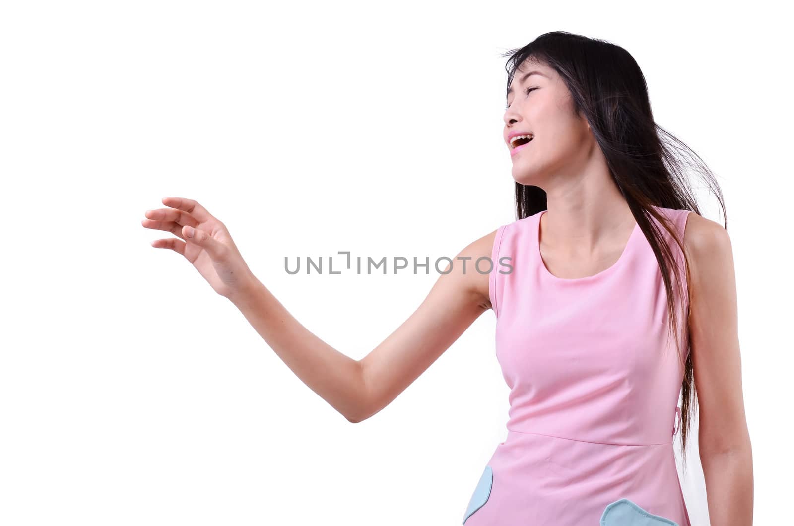 Sad beautiful woman standing against a white background