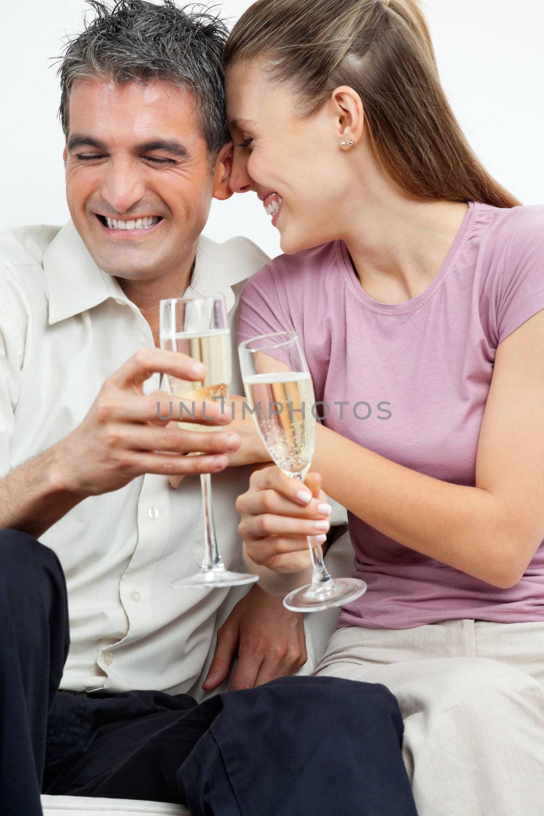 Couple Having Champagne by leaf