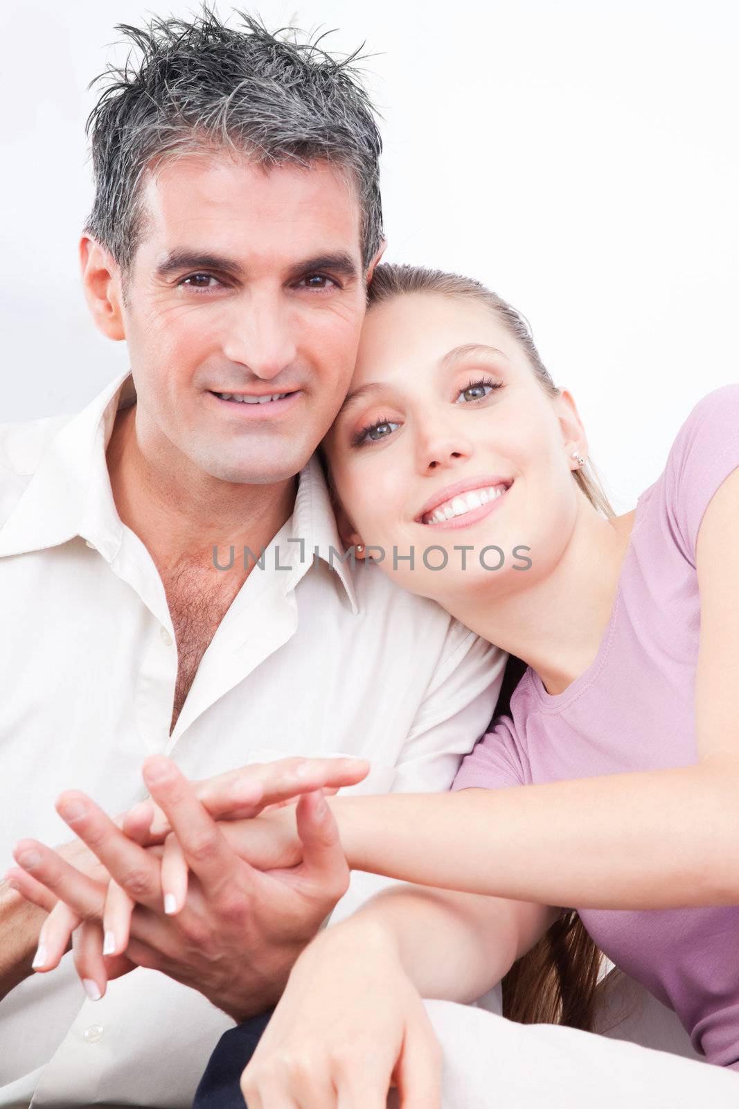 Portrait of lovely couple holding hands.