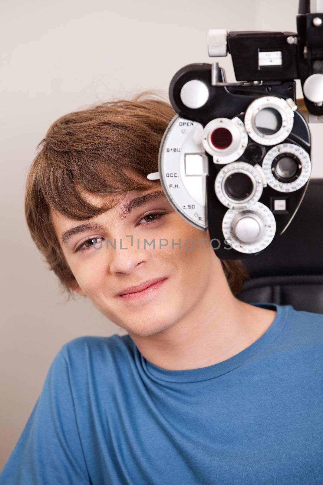 Male Patient Having Eyes Test by leaf