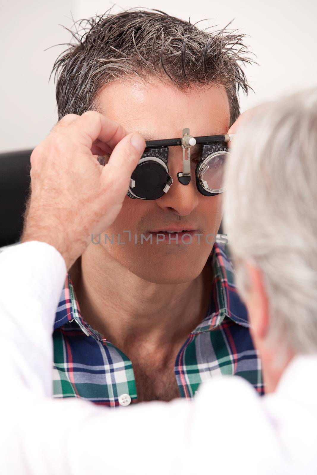 Eye Exam with Measuring Spectacles by leaf