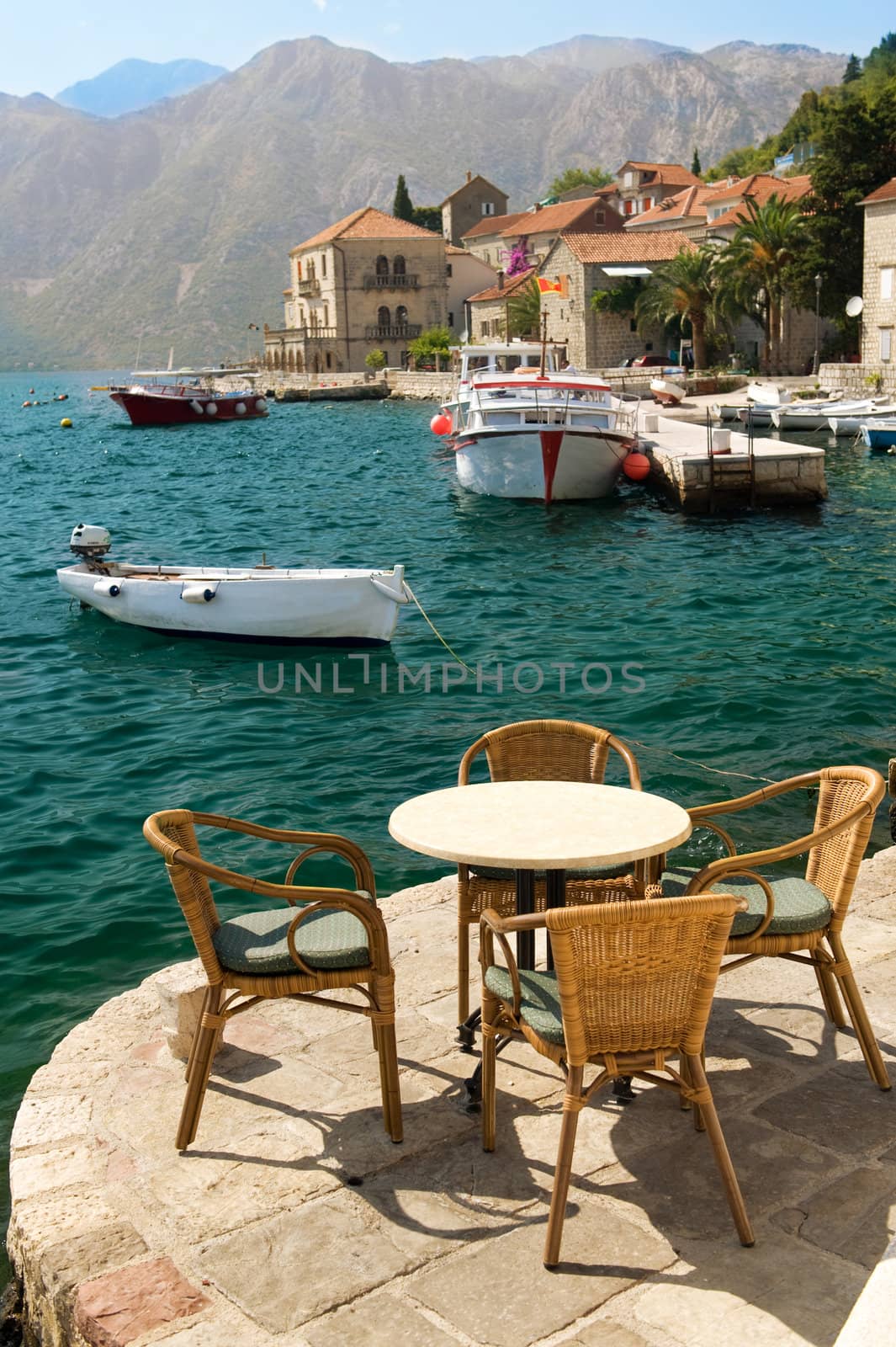 restaurant tables on the Mediterranean Sea in the summer