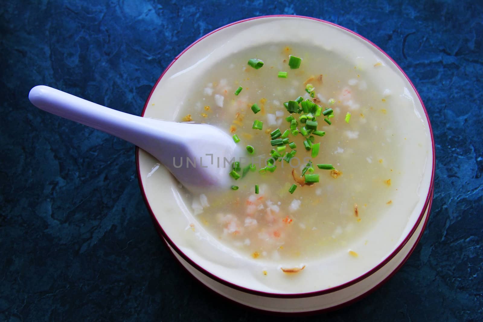 Fish cream soup on a dark blue background