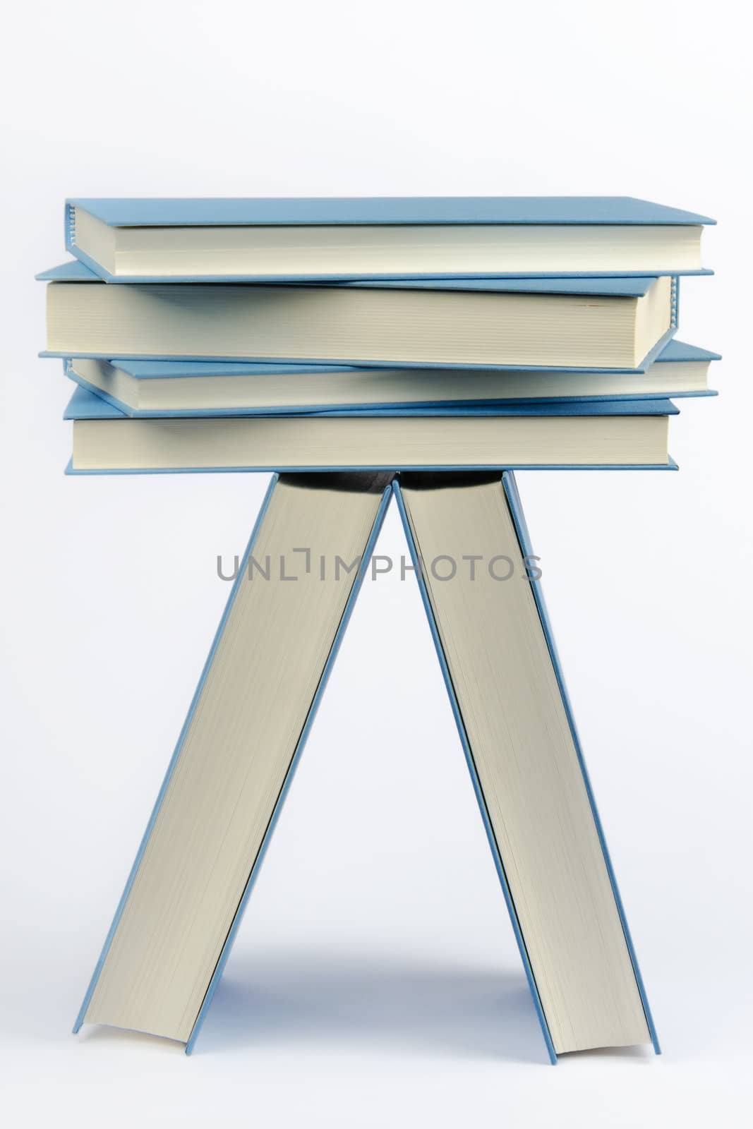 A stack of some closed blue books  by velislava