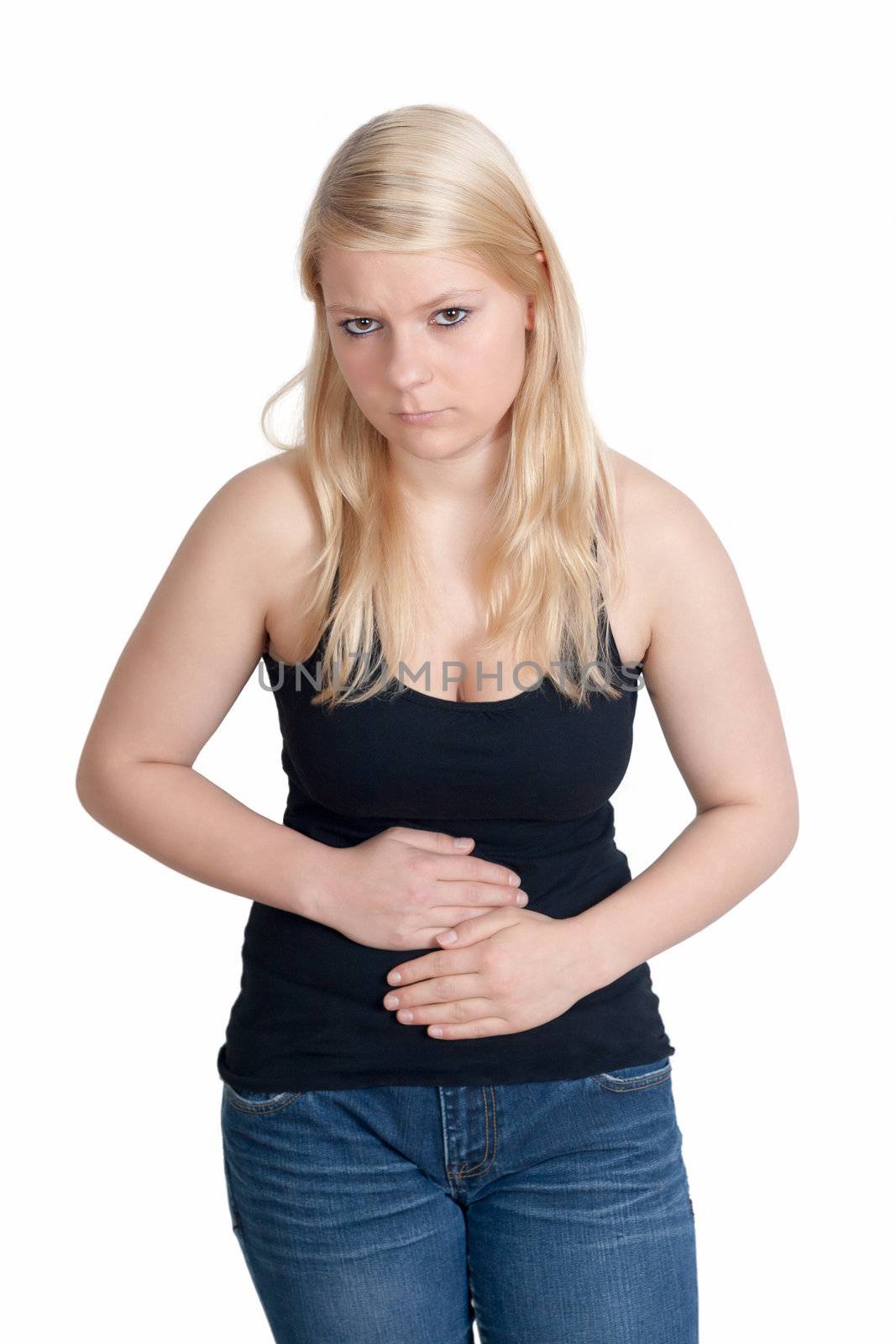 Young blonde woman with stomach ache holding her belly 