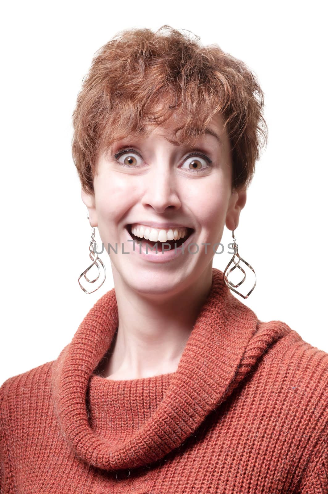 smiling short hair girl cold with orange sweater on white background