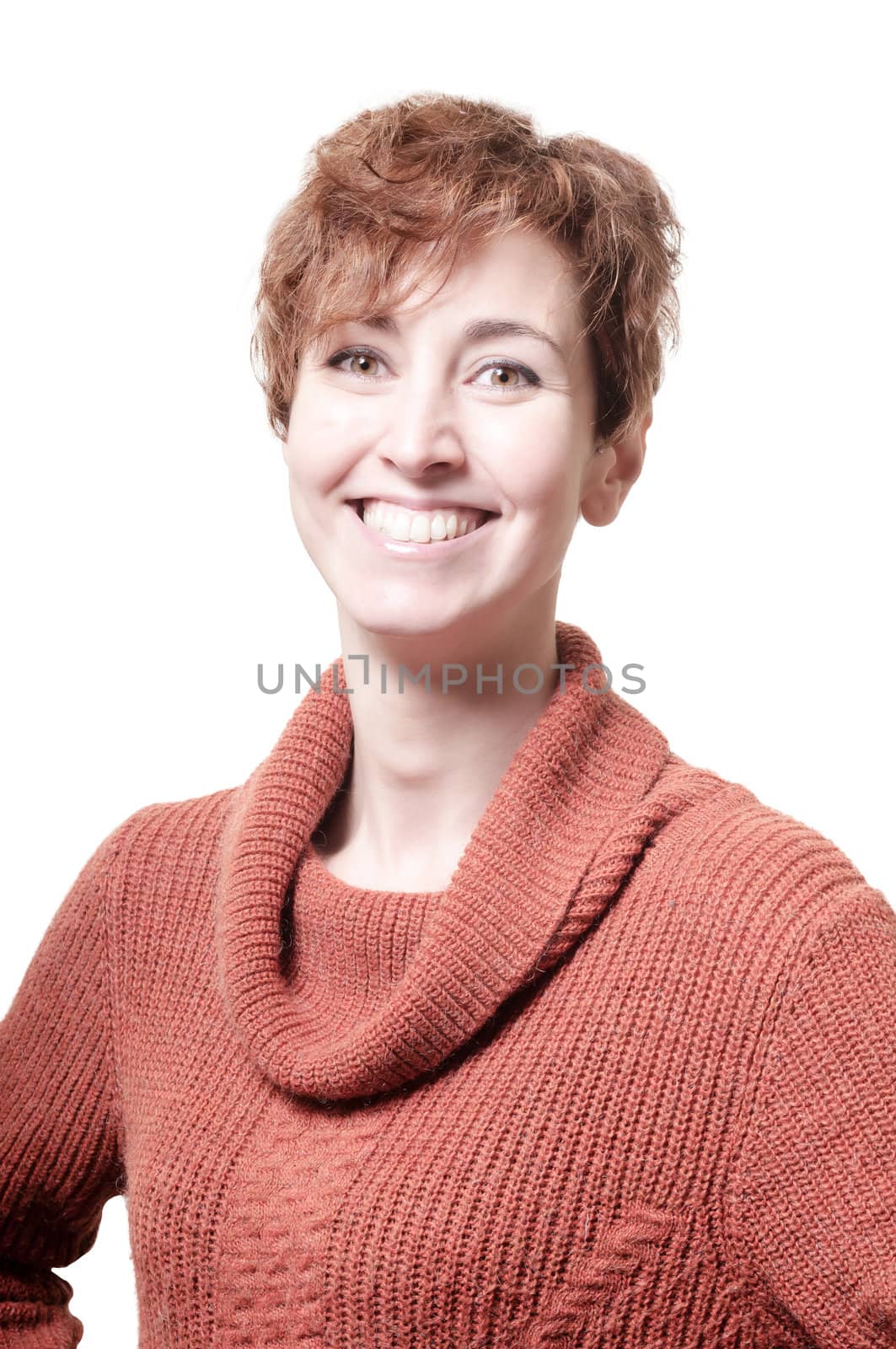 smiling short hair girl cold with orange sweater on white background