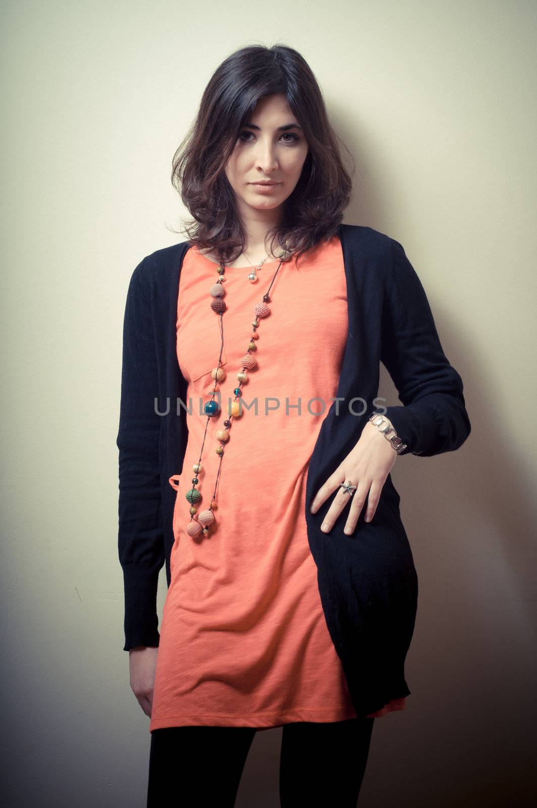 beautiful fashion hipster girl on gray background