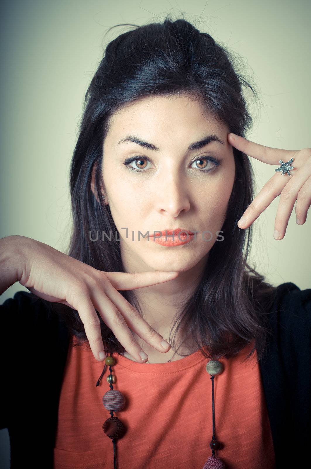 beautiful fashion hipster girl on gray background
