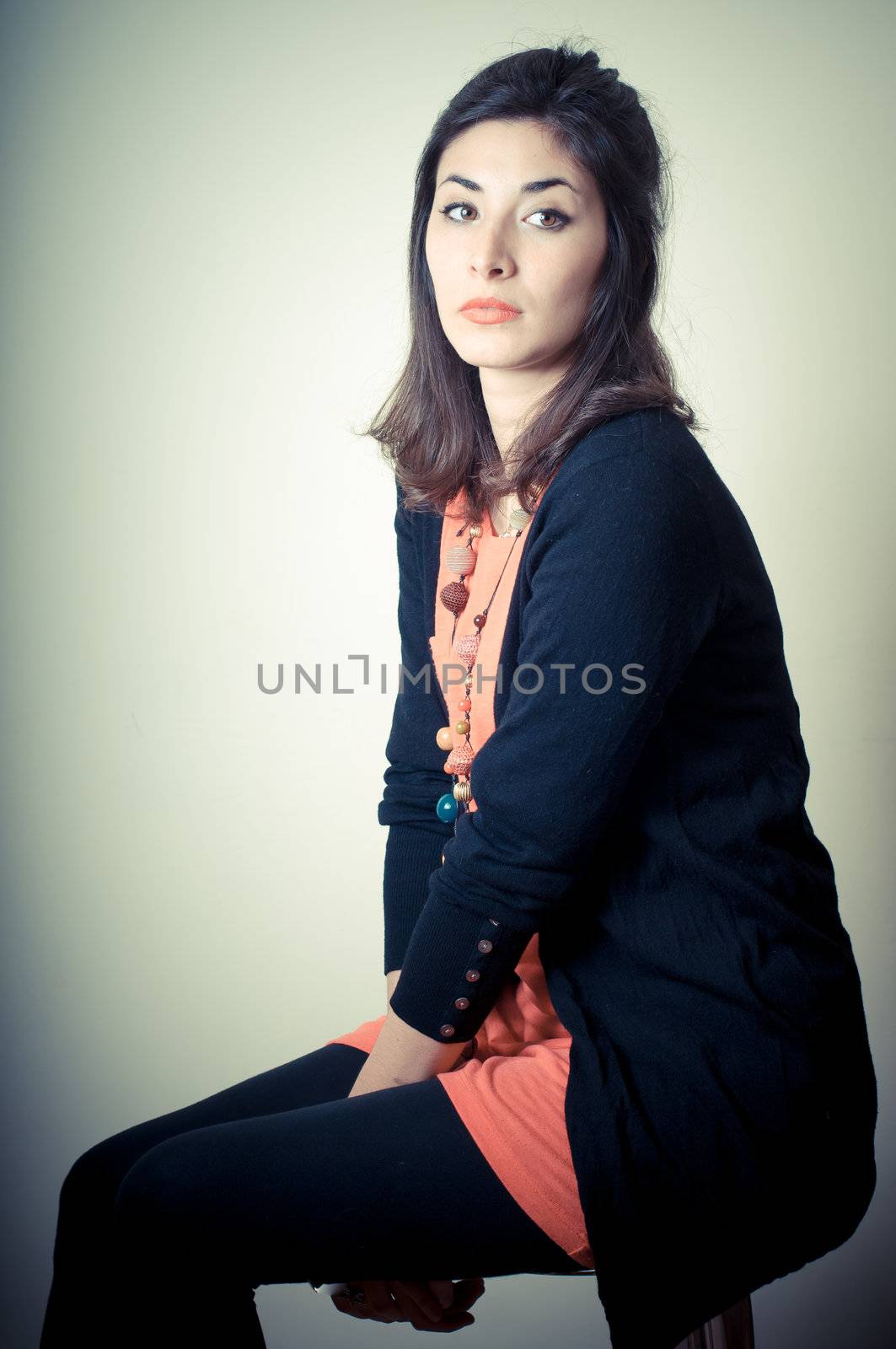 beautiful fashion hipster girl on gray background