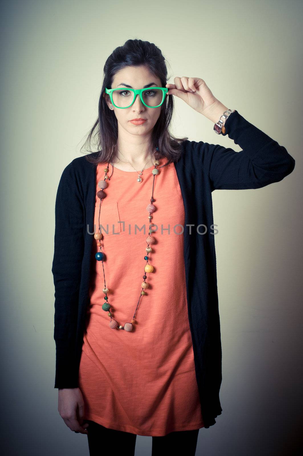 beautiful fashion hipster girl on gray background
