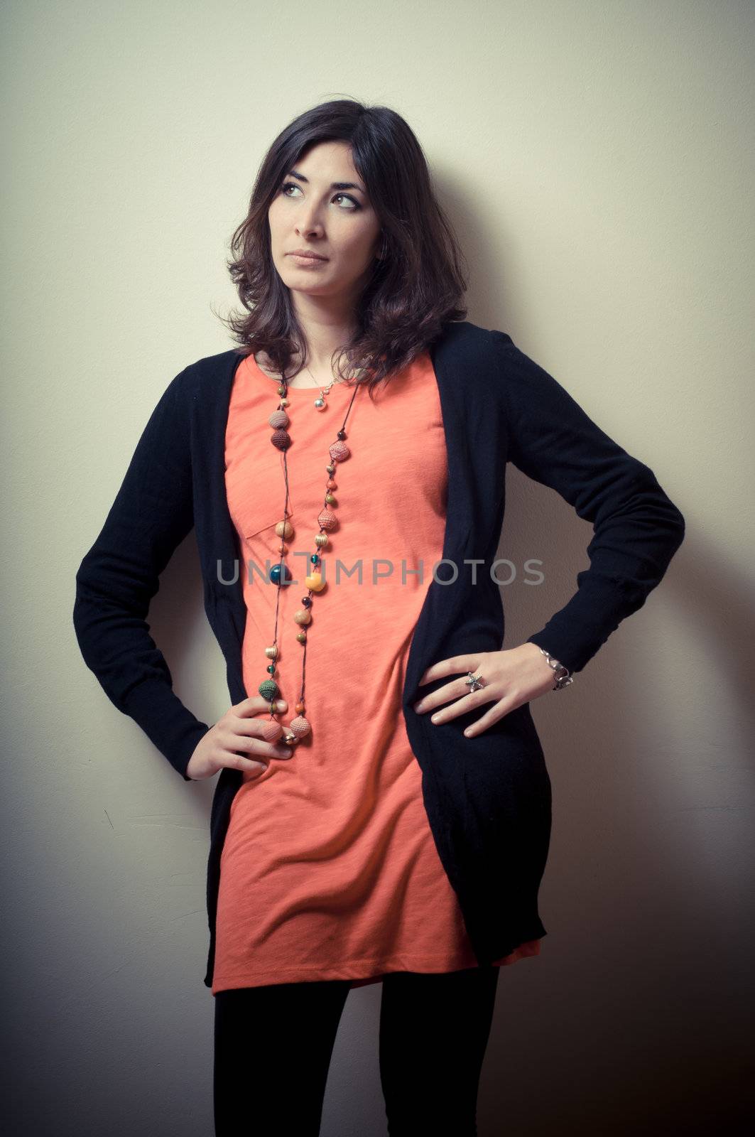beautiful fashion hipster girl on gray background