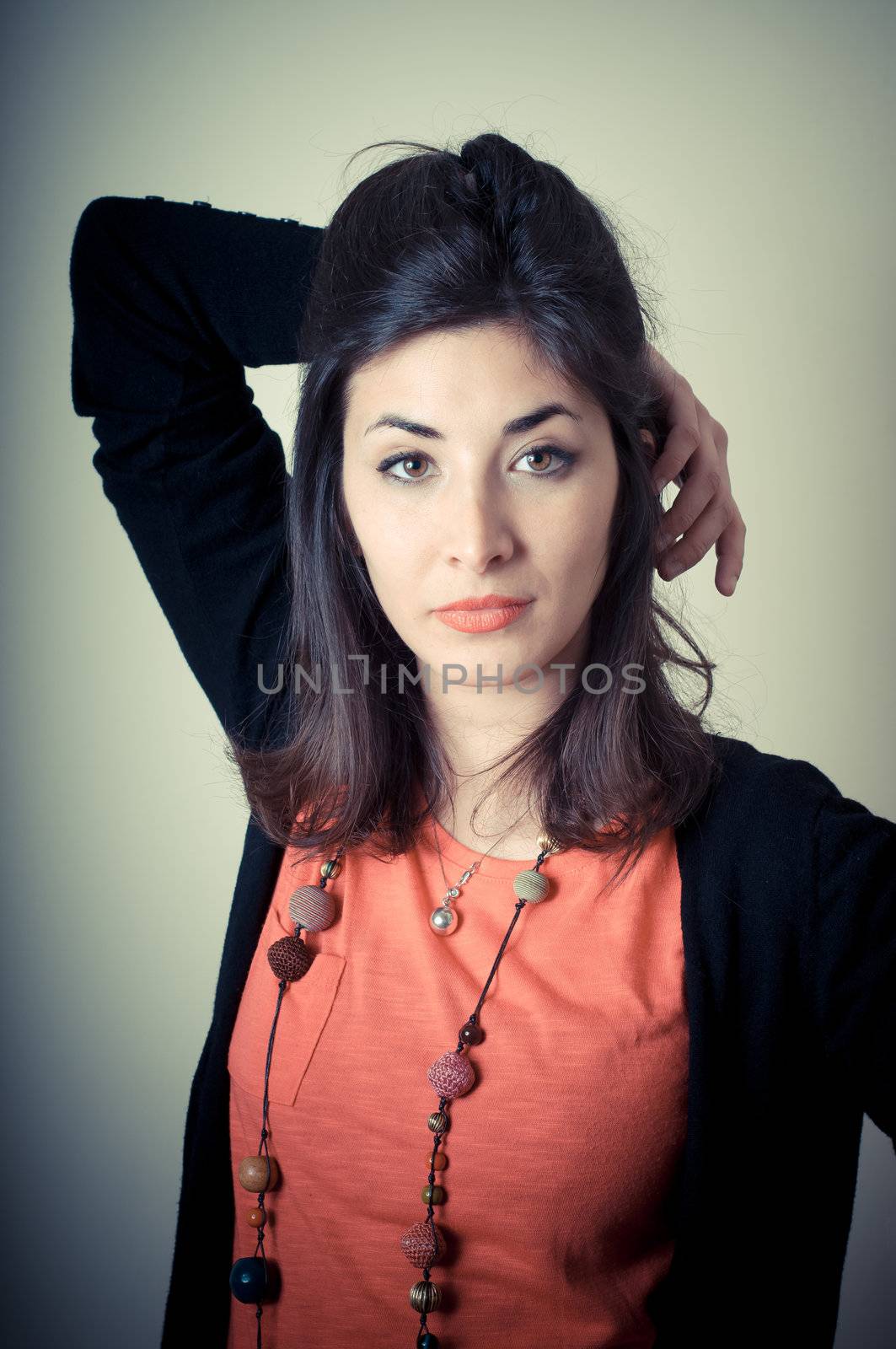 beautiful fashion hipster girl on gray background
