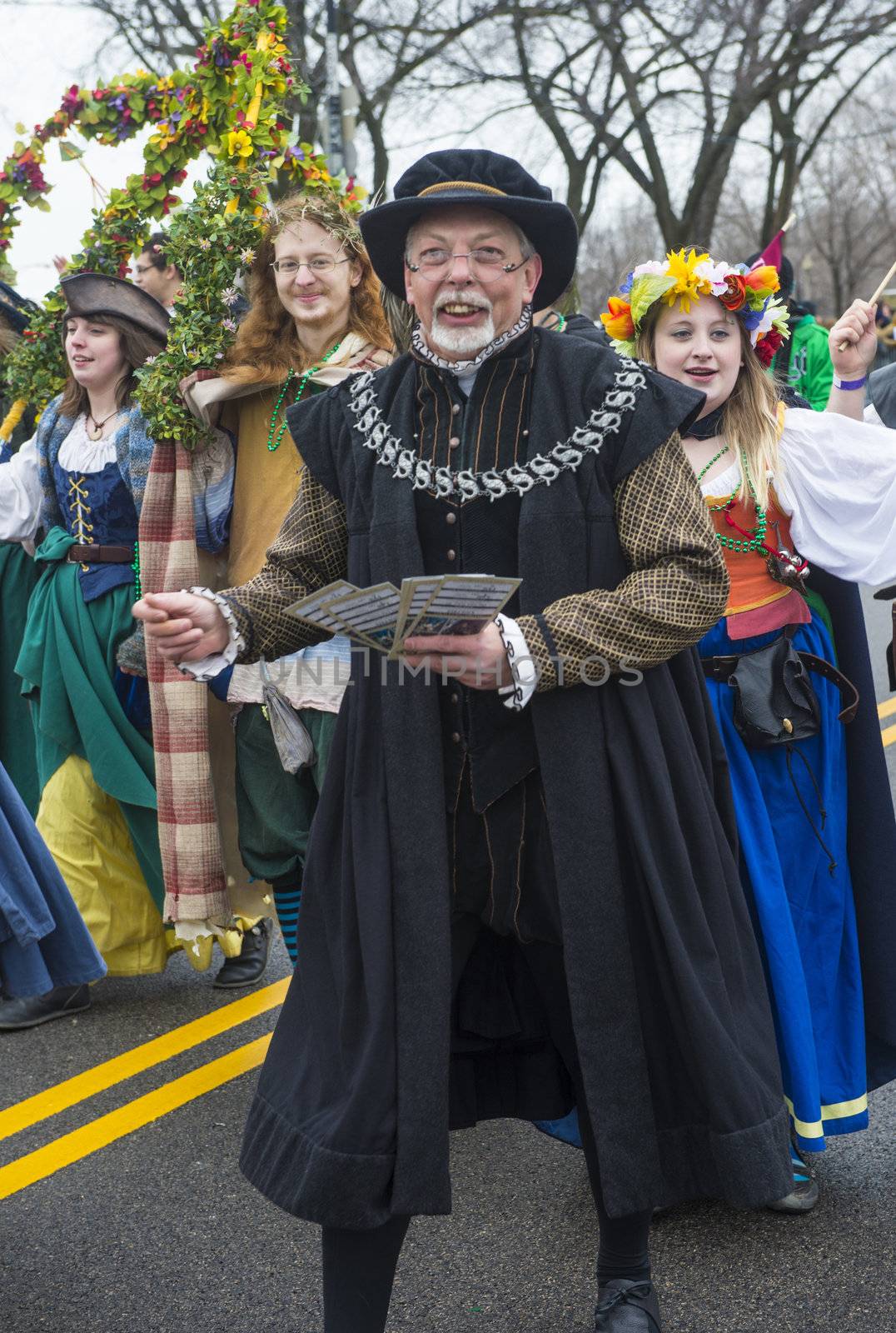 CHICAGO - MARCH 16 : A man with a Renaissance costume Participating in the annual Saint Patrick's Day Parade in Chicago on March 16 2013