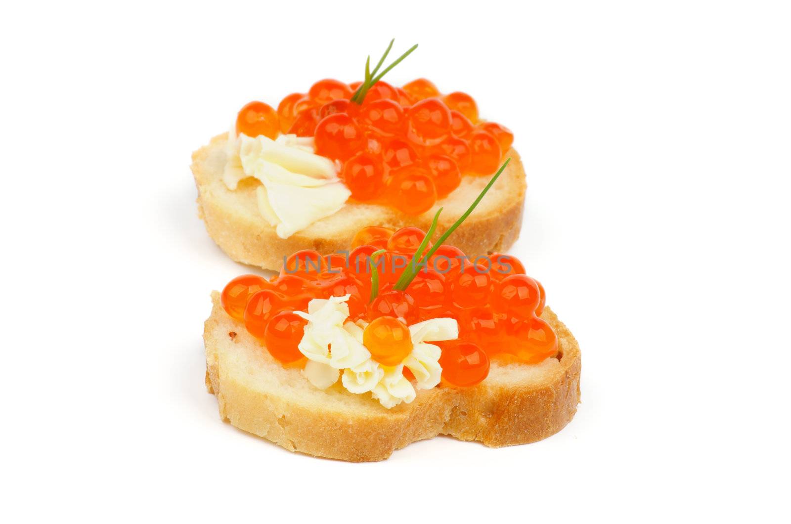 Two Delicious Red Caviar Snacks with Butter, Spring Onion and Baguette isolated on white background