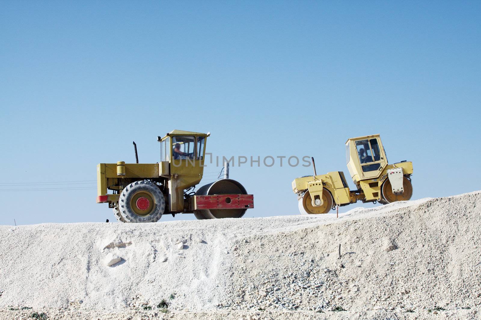 Road rollers in work on construction site