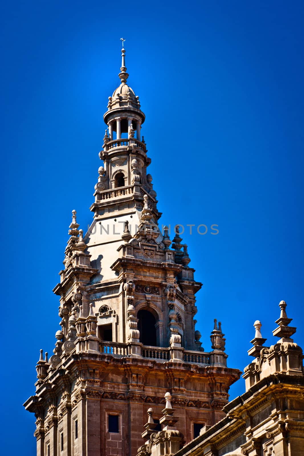 Top of cathedral in Spain against the clear blue sky