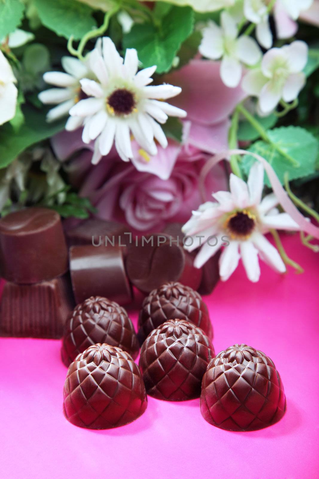 Chocolate sweets and flowers by Novic
