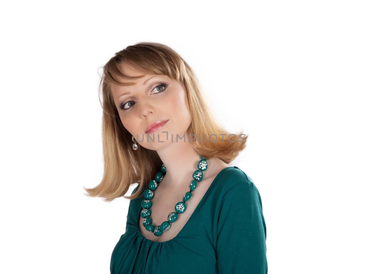 beauty portrait of a blonde in a green dress isolated on white background