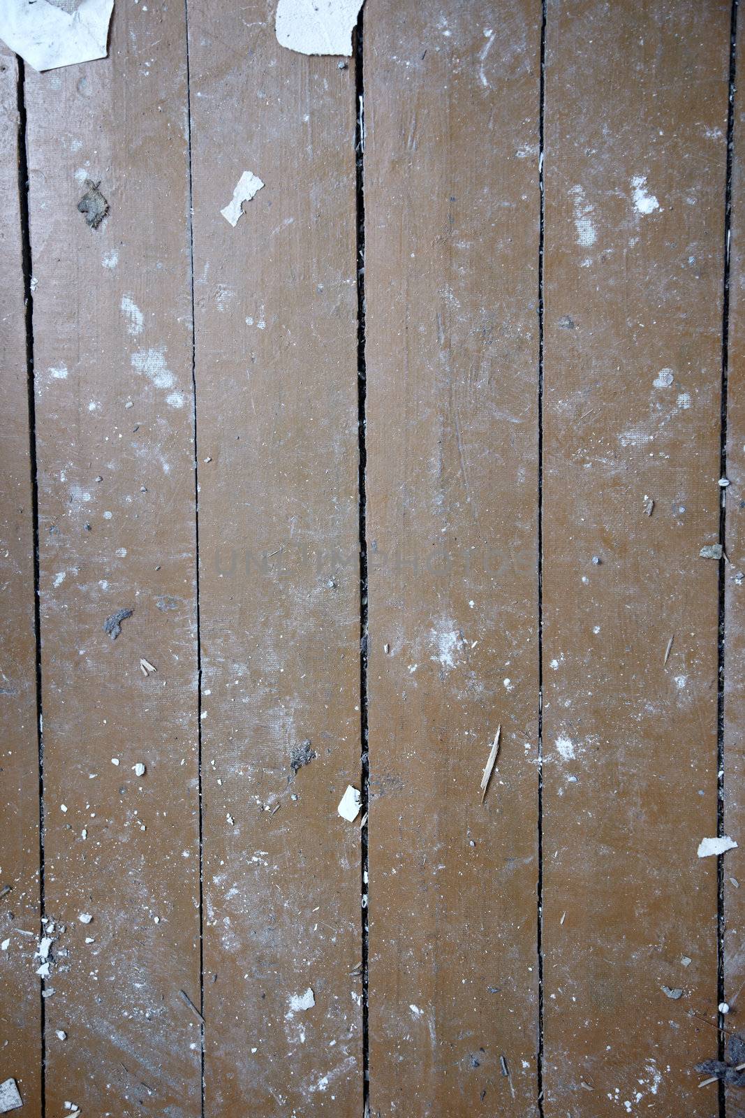 Wood planks with rubish. Close-up vertical photo