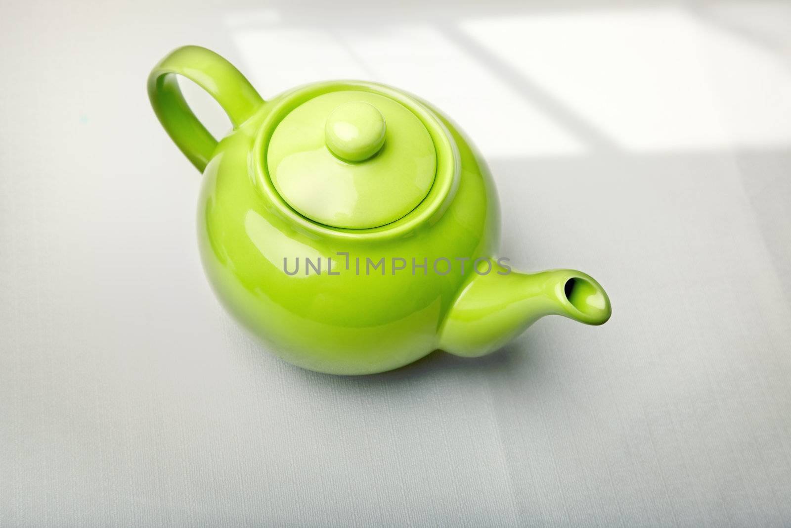 Green teapot by Novic