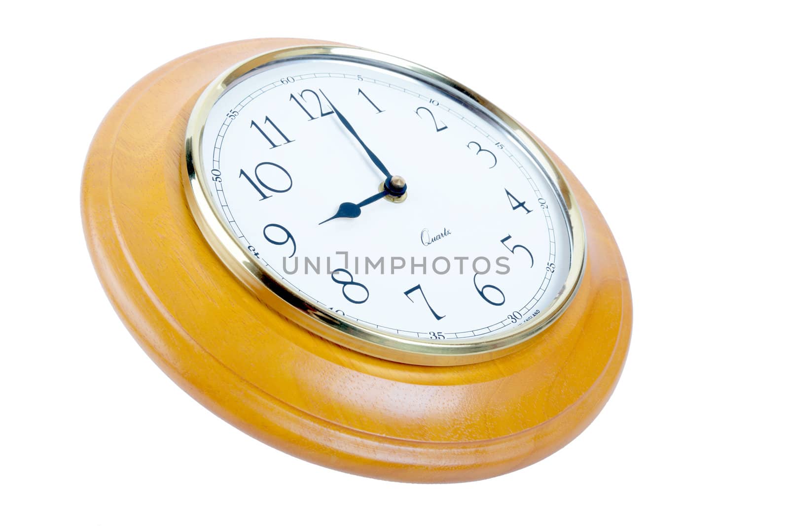 wooden wall clock showing 9 o'clock isolated on white
