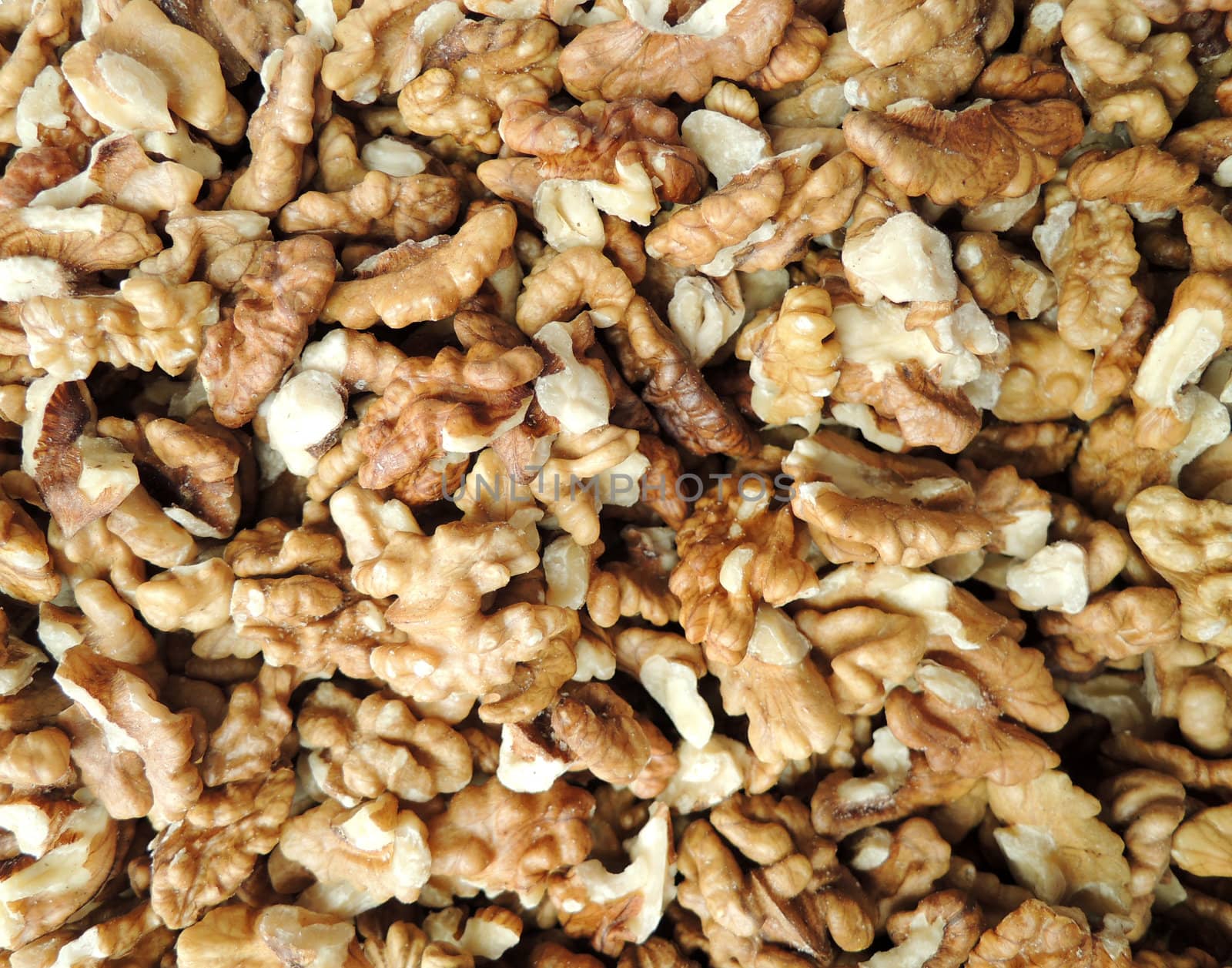 Close-up of shelled walnuts background