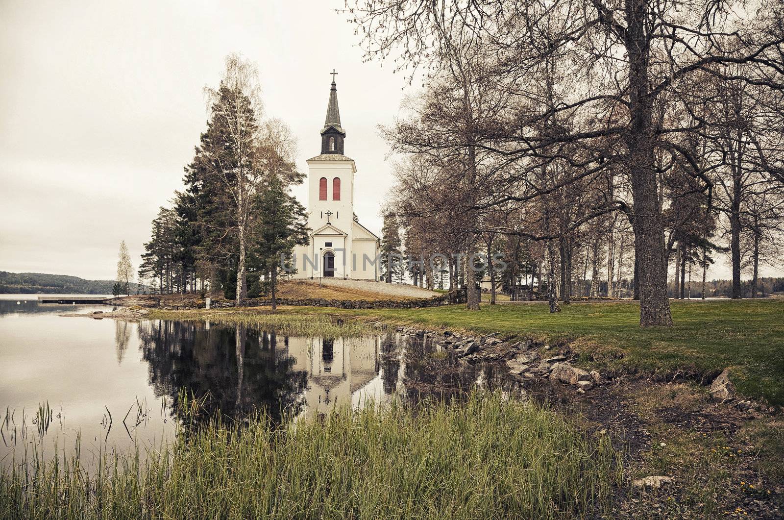 The beautiful Faagelvik Church - Varmland, Sweden situated right down to a tranquil  lake.
