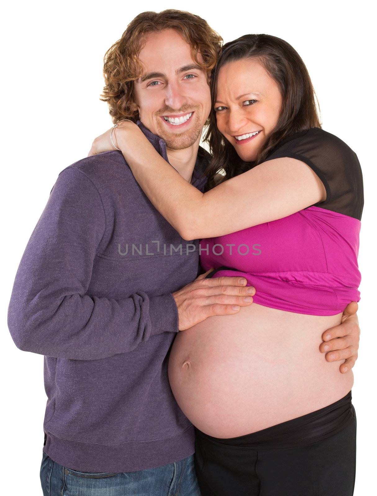Joyful expecting parents over isolated white background