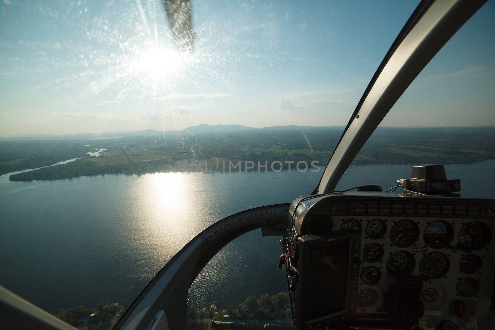 Aerial photography from a helicopter cockpit