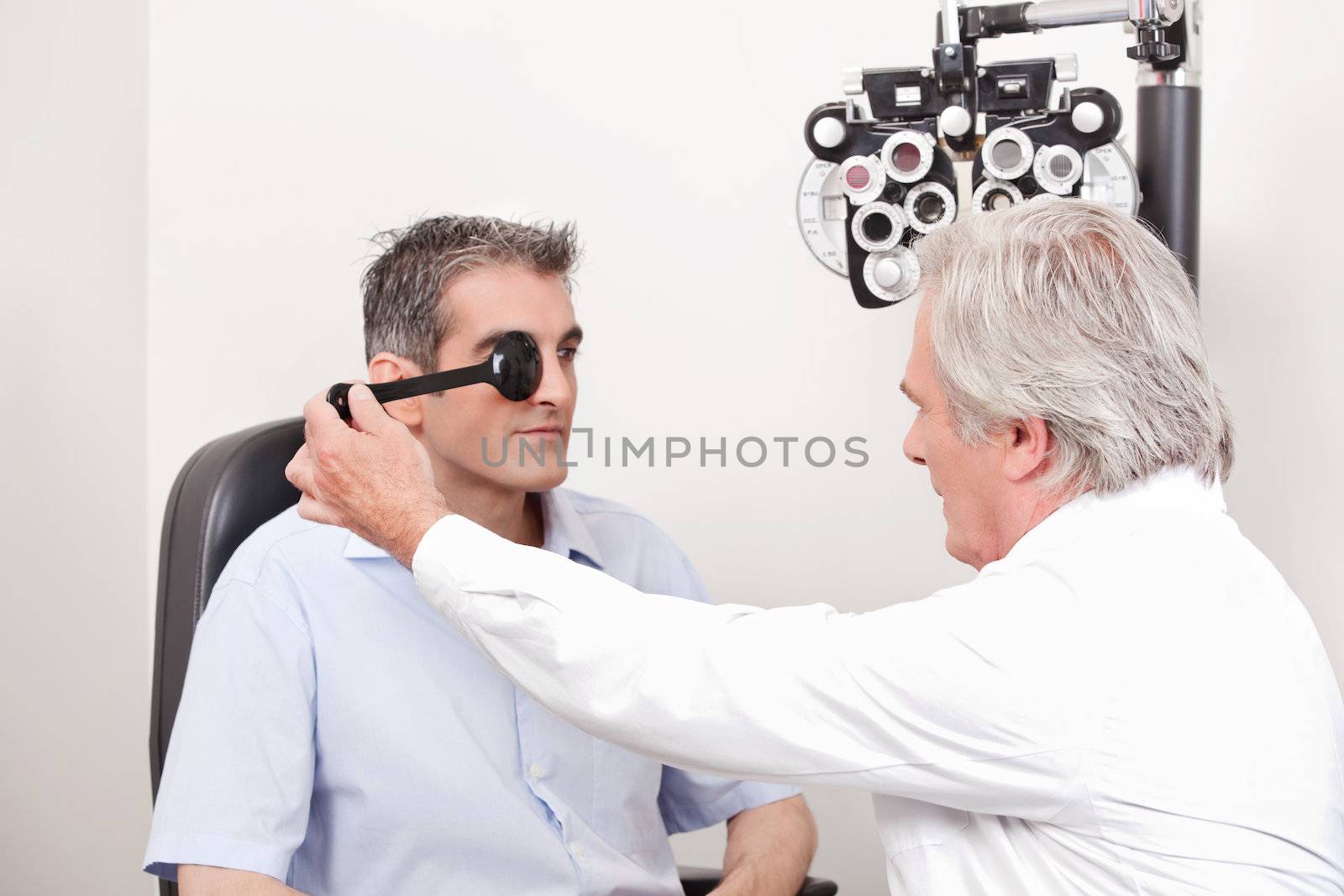 Patient Having his Eyesight Tested by leaf